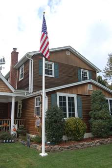 Hinge Base 40' Standard Fiberglass Flagpole | External Halyard | Wide Base Diameter - Action Flag
